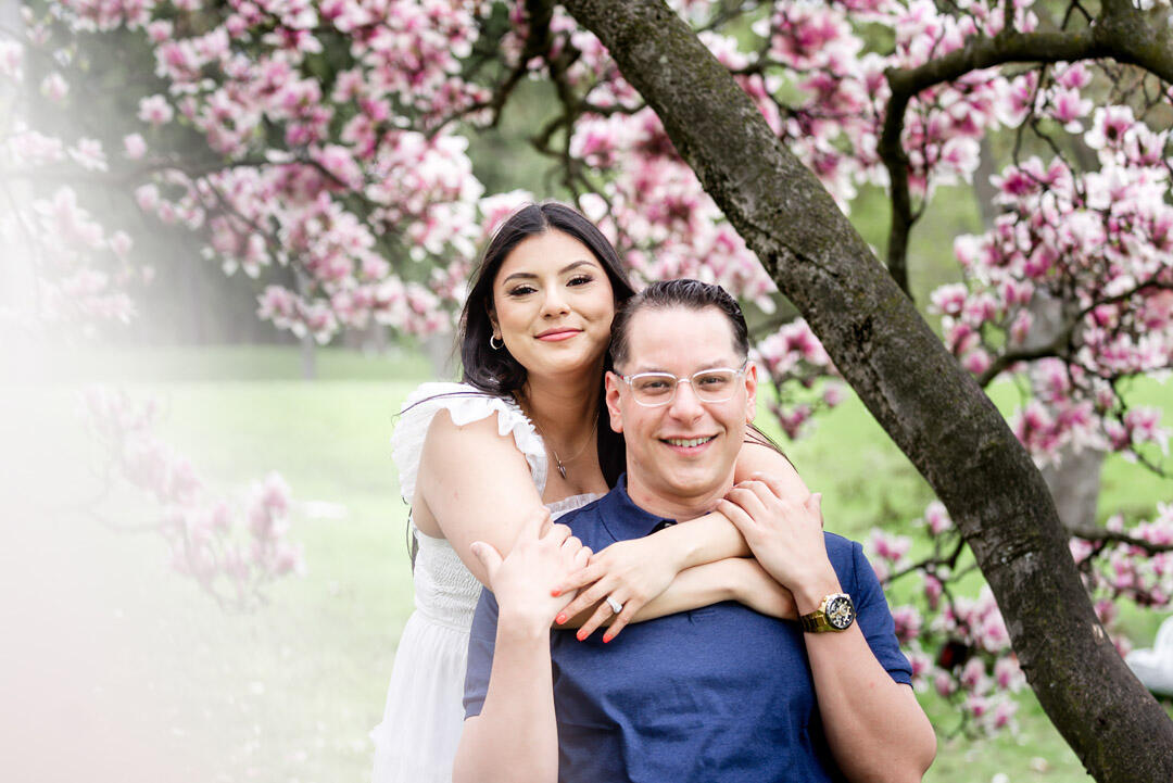 Untitled Couple - hugging arms around each other